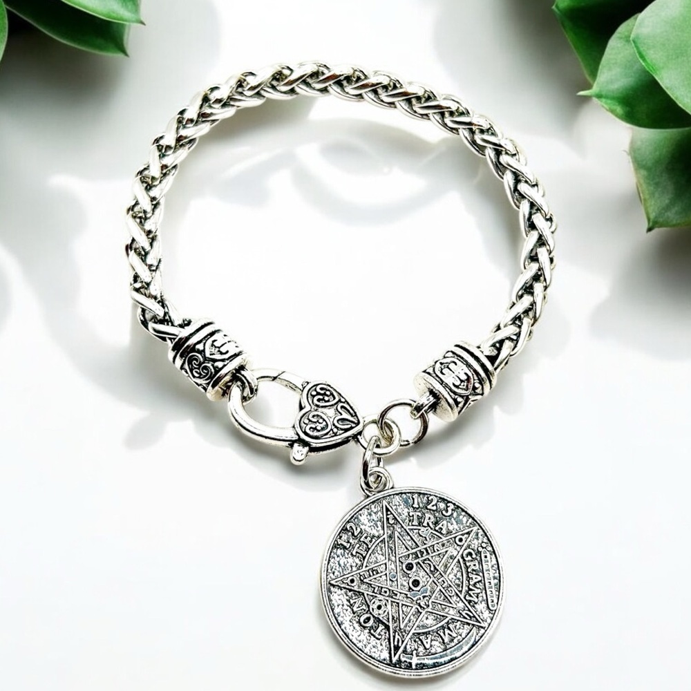 NWOT pentagram braided bracelet with heart clasp 7” adjustable